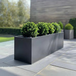 large grey planters tall trough planter long planter woven wood