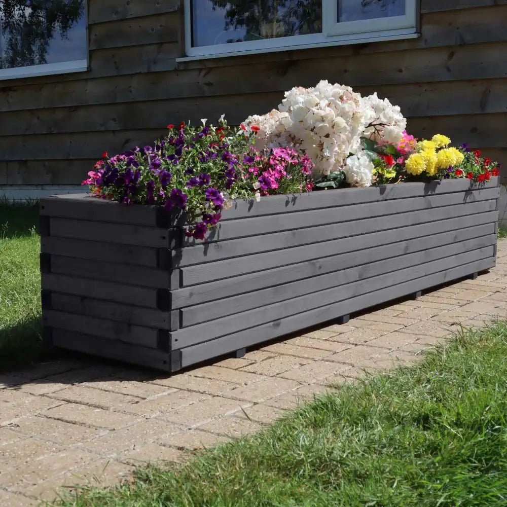 Extra-large wooden planter perfect for creating a vibrant entryway display.