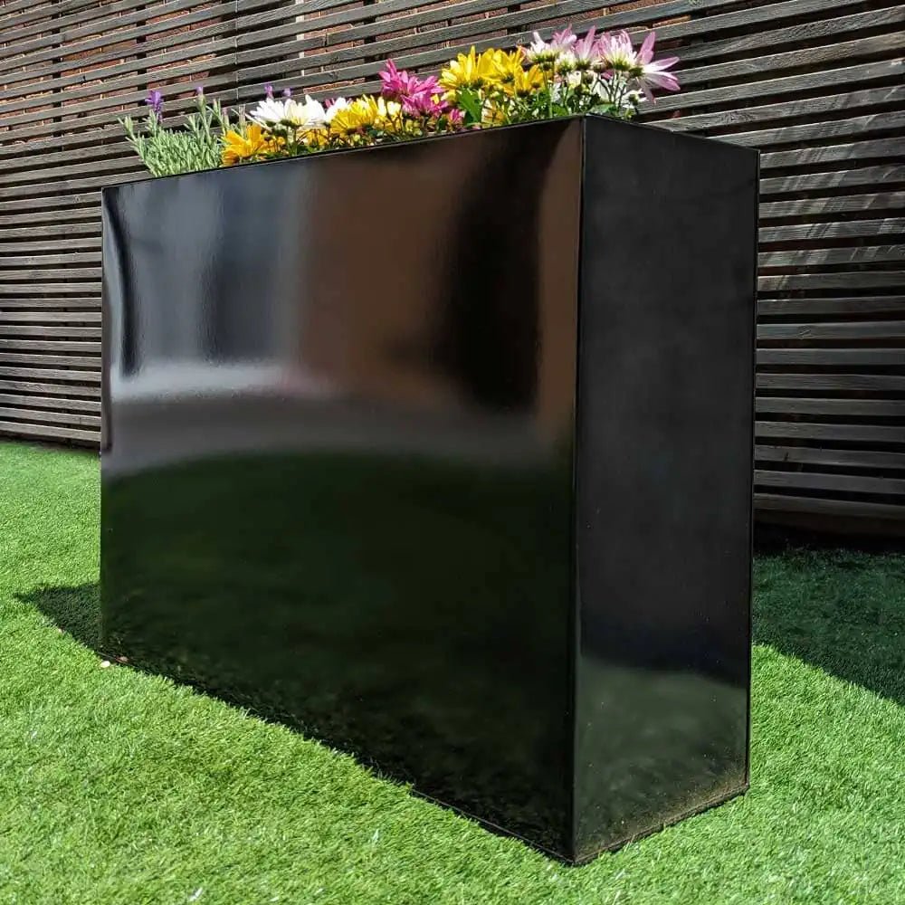 A spacious large outdoor planter filled with vibrant flowers.