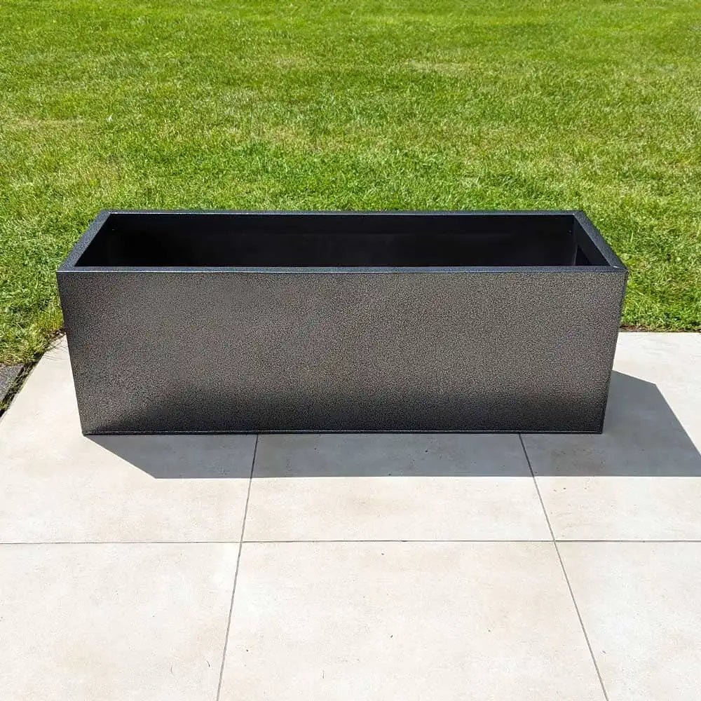 Massive, huge planters enhancing outdoor spaces.