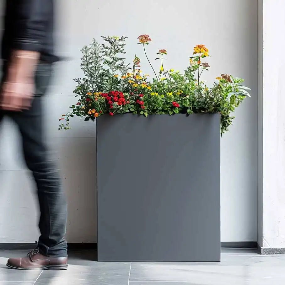 Extra large grey planters brimming with lush foliage.