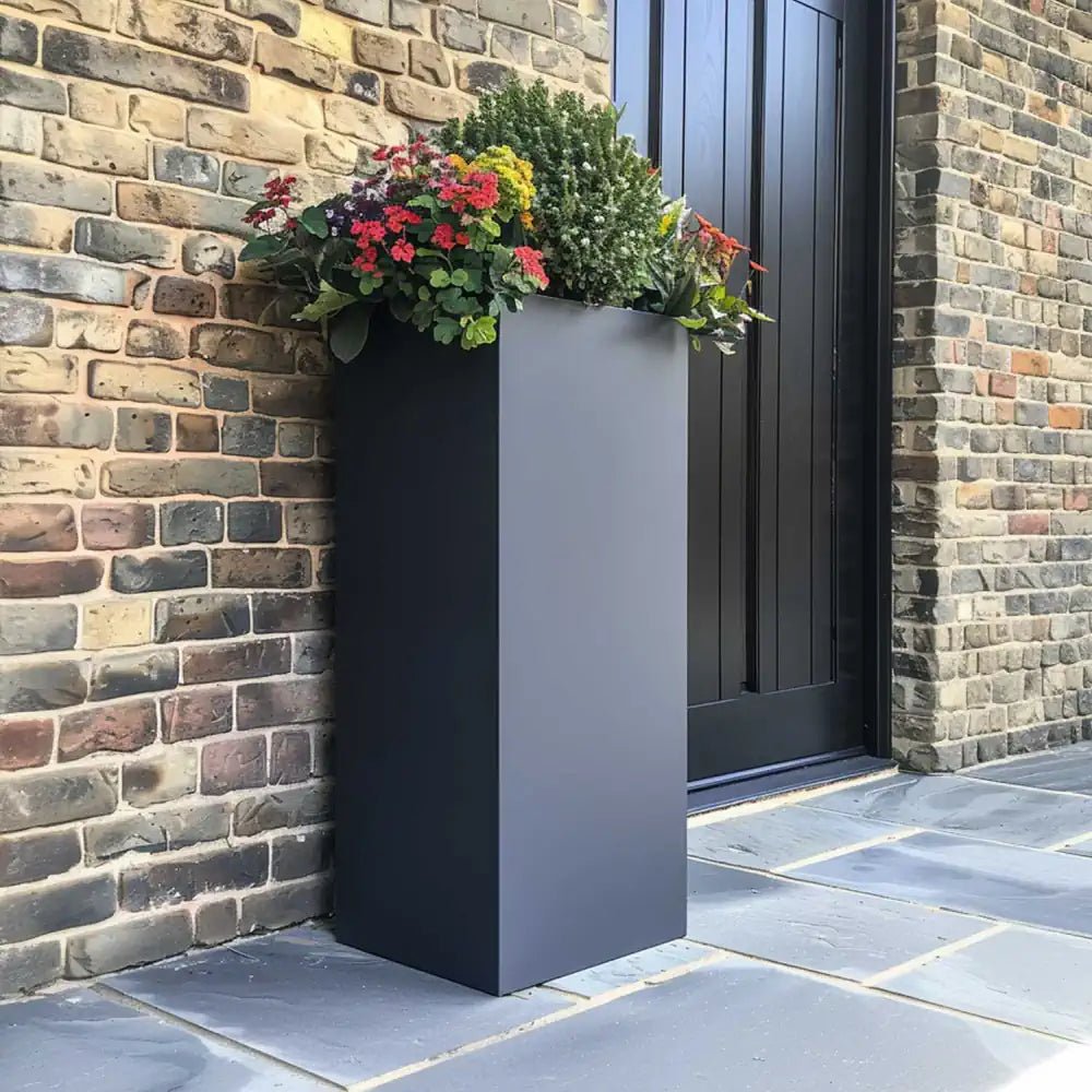 Standing grey plant pots filled with greenery, creating a tranquil ambiance.