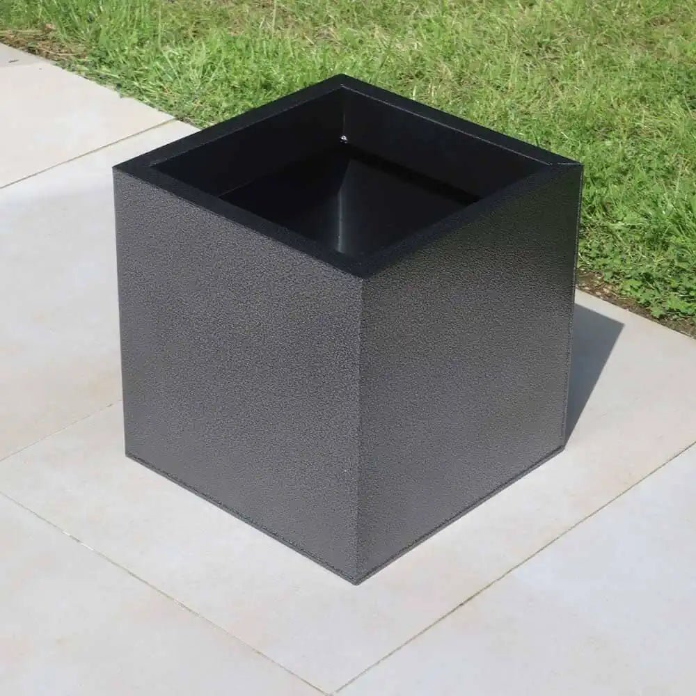 Assortment of huge planters adding charm to a patio