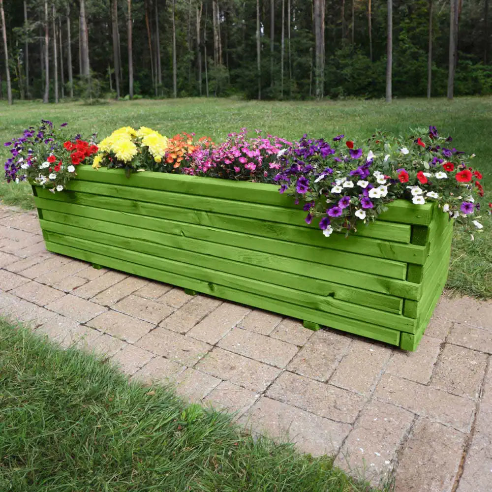 Custom weathered zinc planters zoning the dining and lounge areas of the terrace.