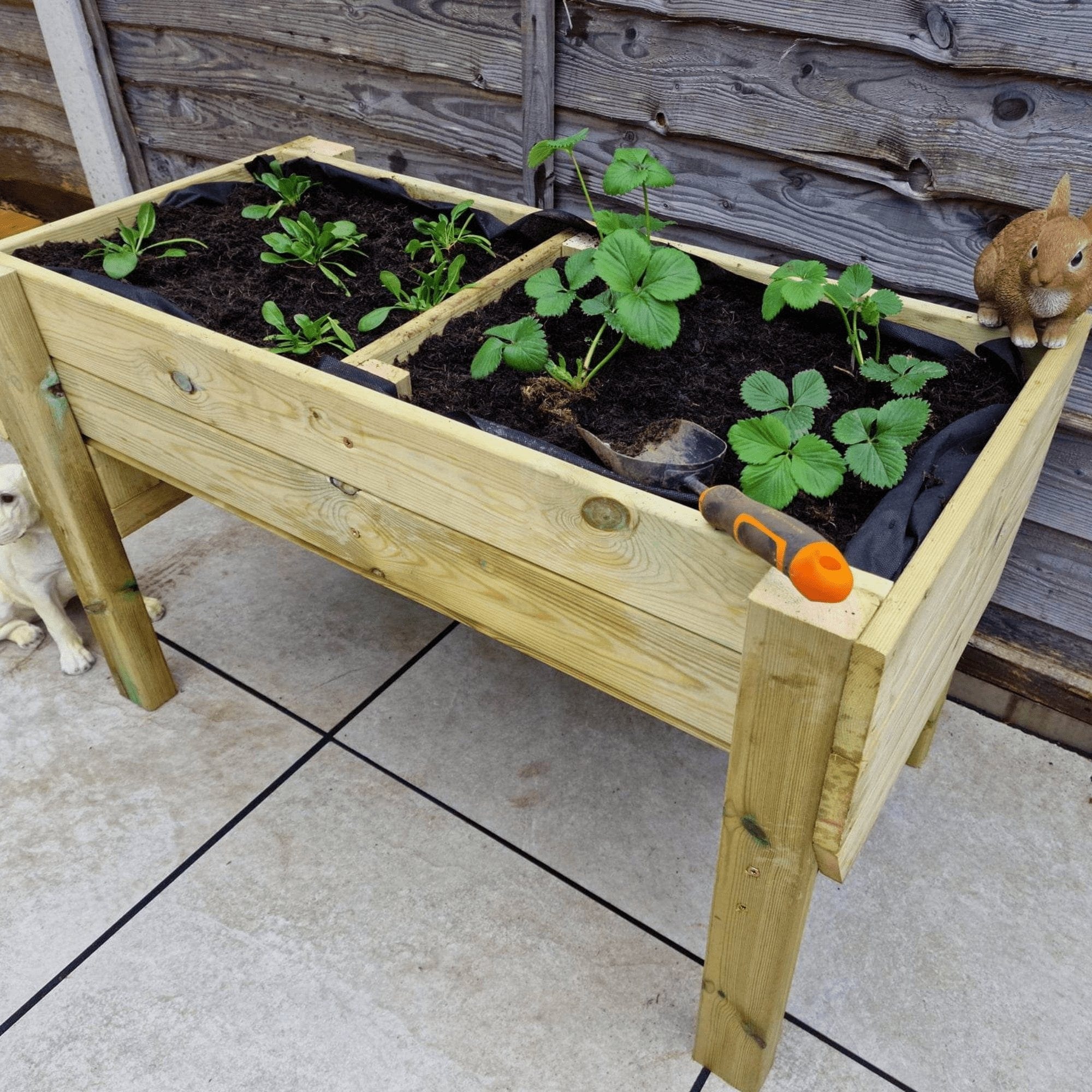 Redwood Veg Trug providing a durable and attractive home for plants.