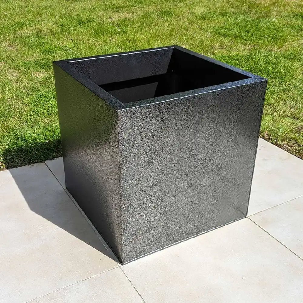 Zinc planters blending seamlessly with the outdoor decor.