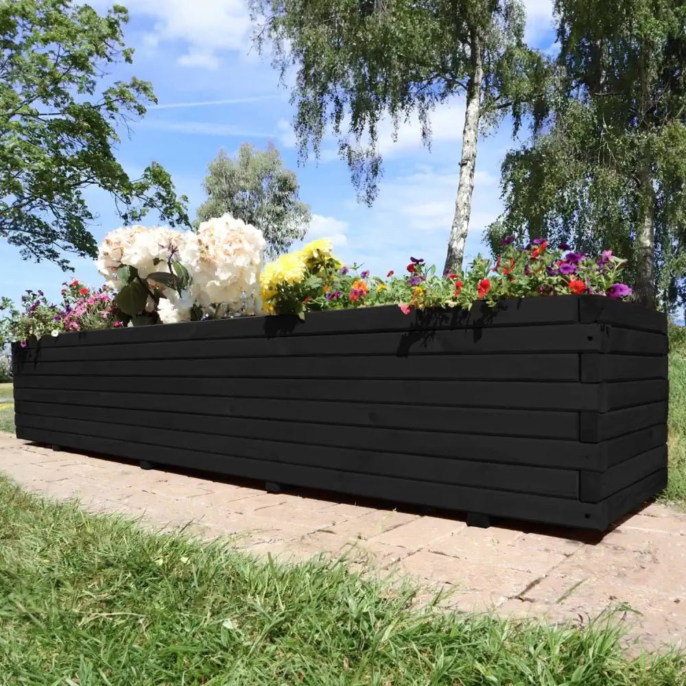 Large wooden planters are a versatile choice for adding functionality and natural beauty to any outdoor area.