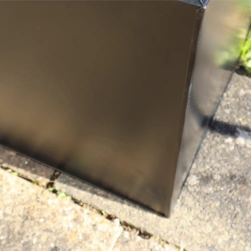 Ample space in this zinc planter lets your creativity blossom, accommodating diverse plant combinations.