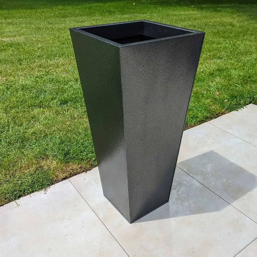 Huge planters making a statement in outdoor spaces.