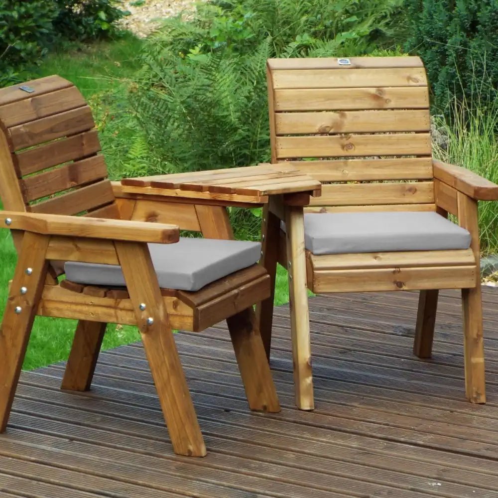 A cozy retreat: Wooden garden furniture with a rustic charm.