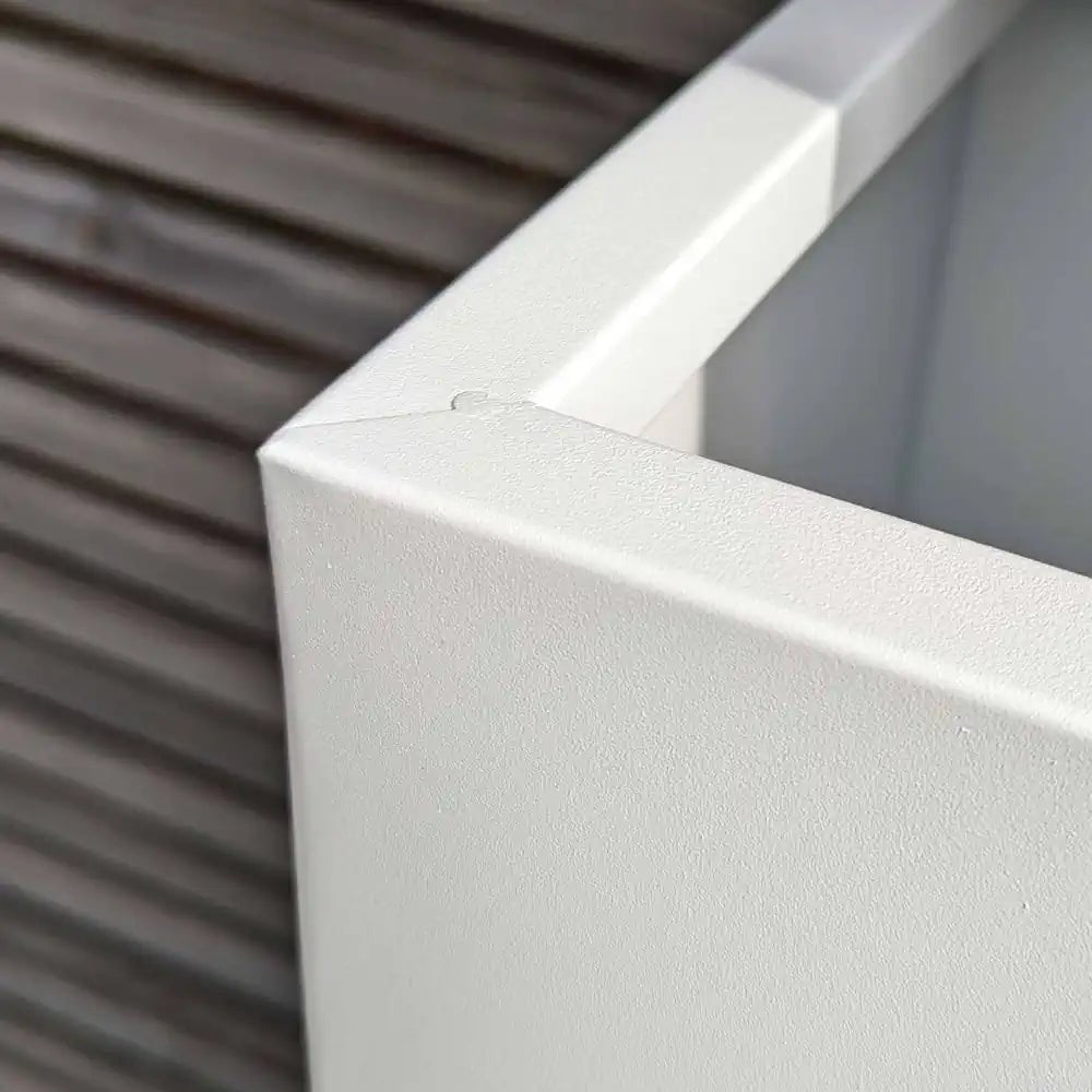 Shiny and durable zinc planters for a modern touch.