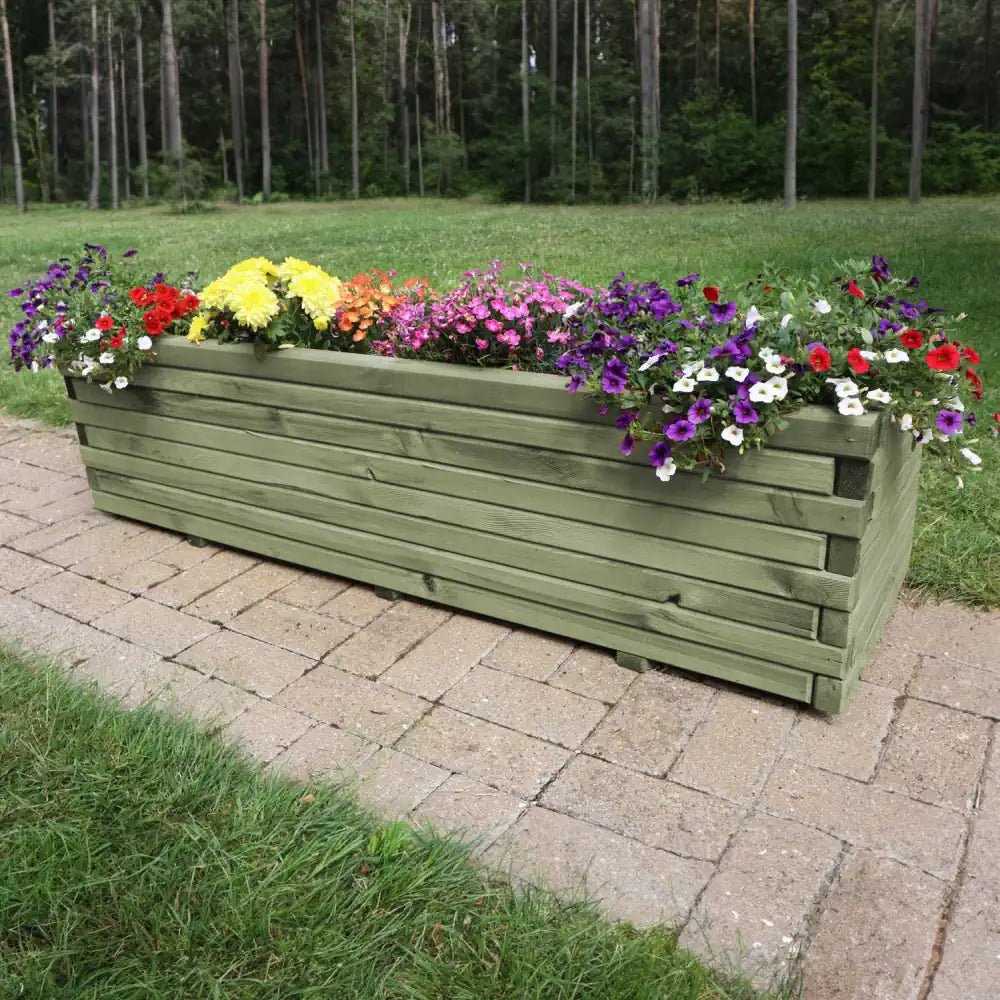 Large wooden trough planters add a natural touch to any patio or balcony, creating a welcoming ambiance.