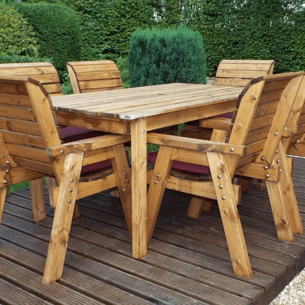 A comfortable and intimate two-seater teak garden furniture set