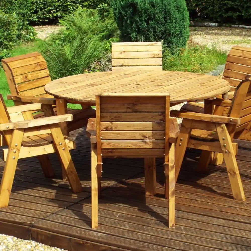Create a rustic yet modern vibe with a Wooden Garden Furniture Set paired with sleek bistro chairs on your patio.