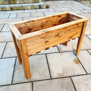 Standing trough wooden garden planters by Woven WOod 1.1m Redwood Trug