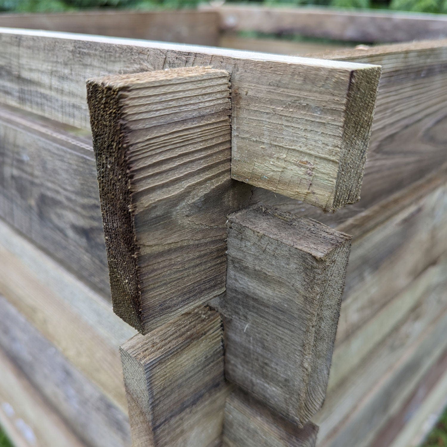 Close up of easy assemble pressure finished compost bin
