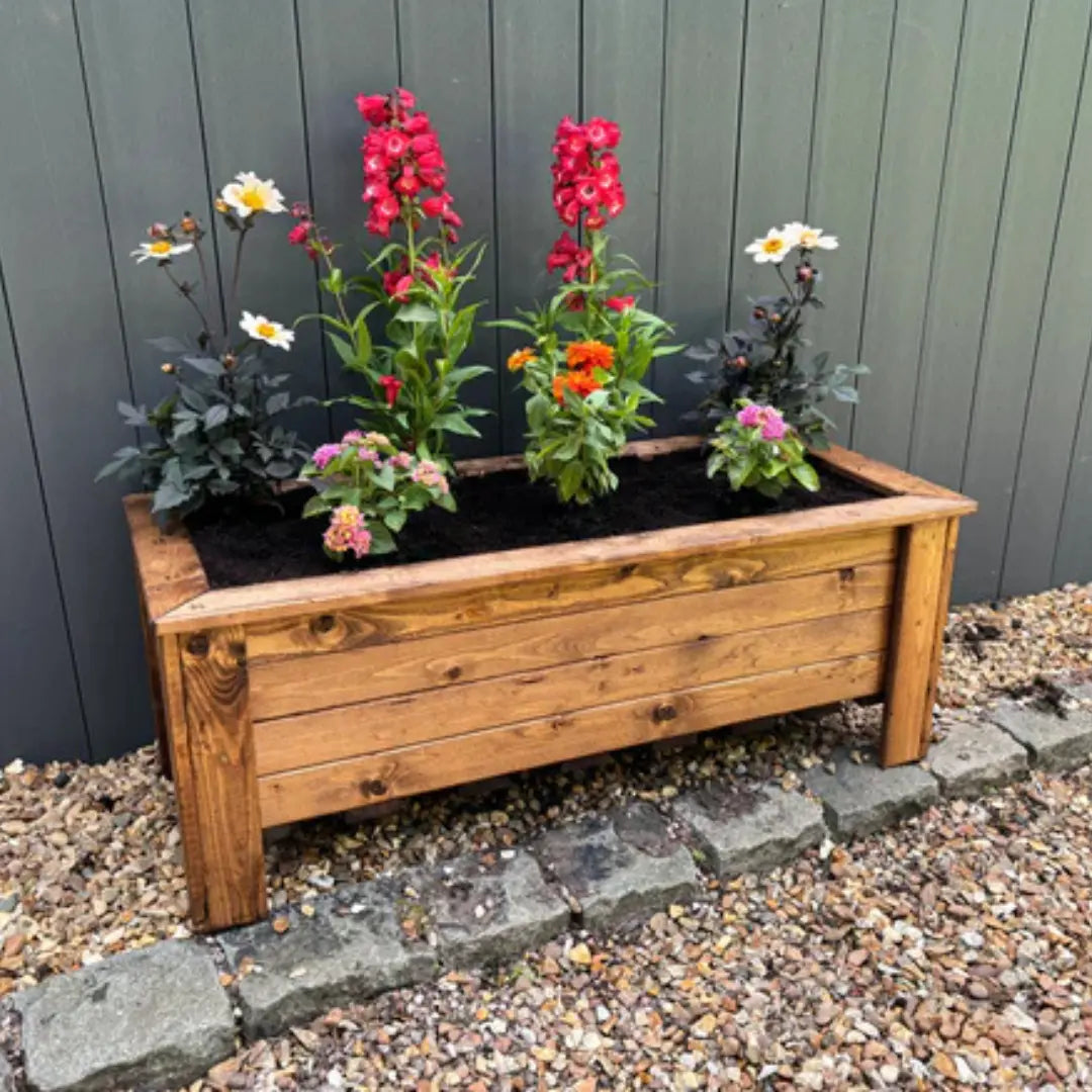 raised garden planters standing trough woven wood