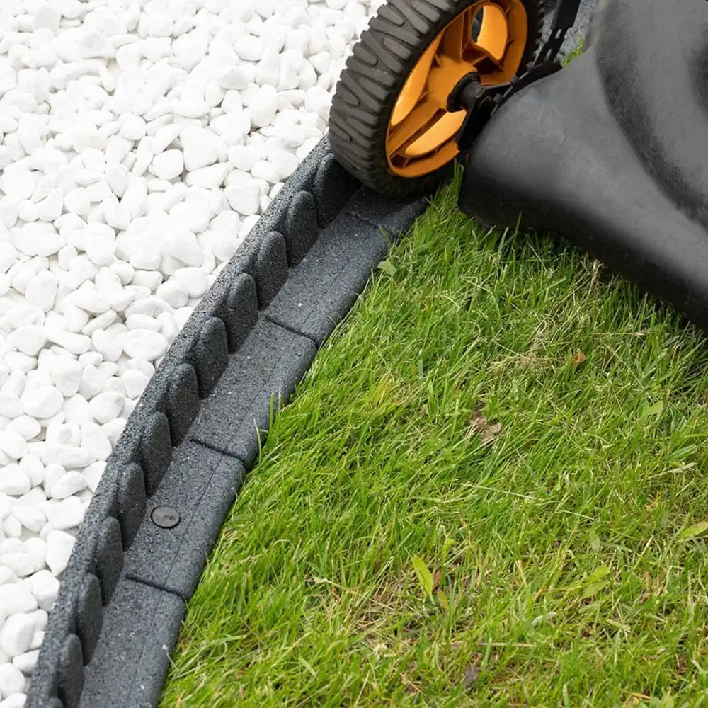 Embrace natural beauty with a low-maintenance approach using recycled lawn edging for your garden.