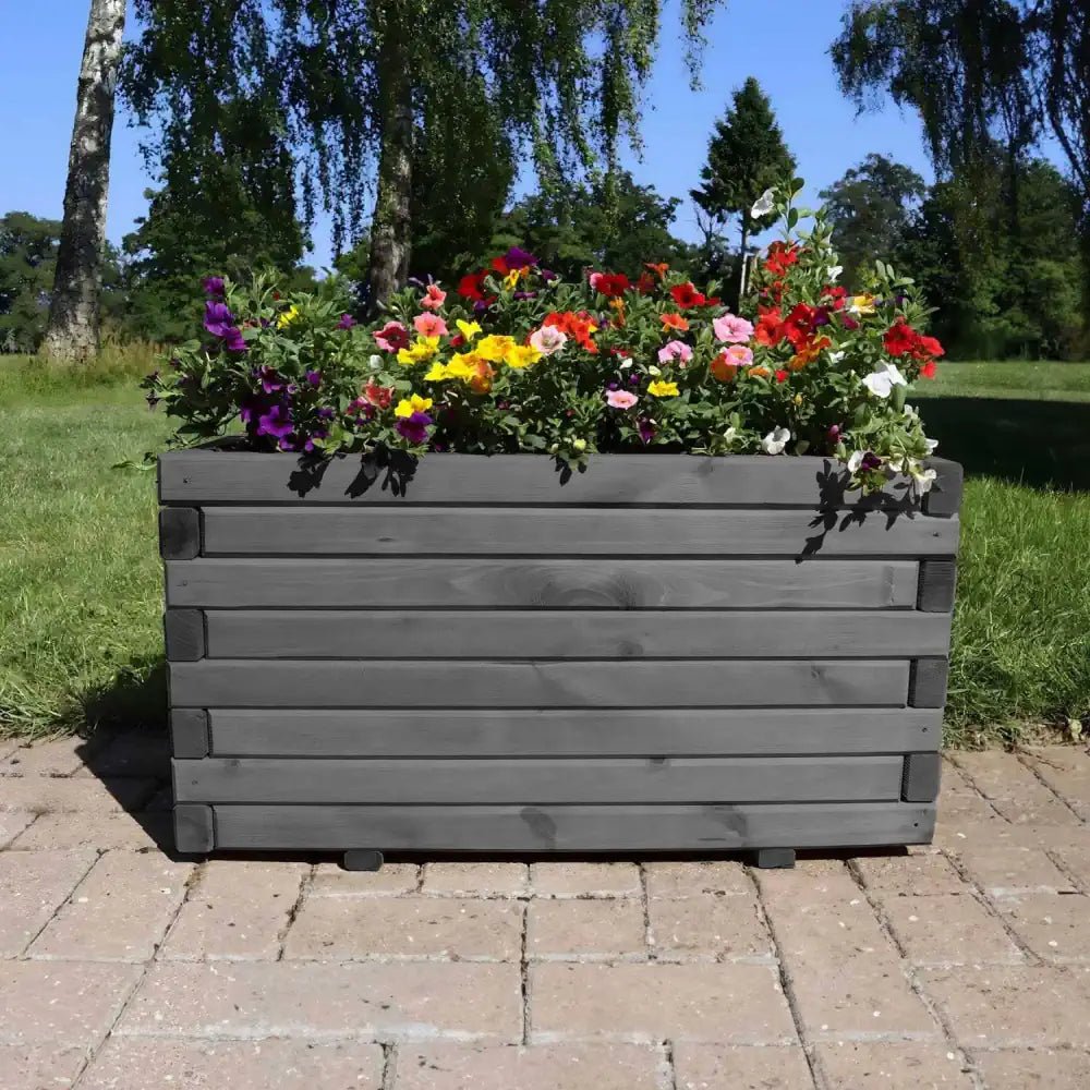 Painted wooden planters in vibrant colors add a playful touch to your garden.