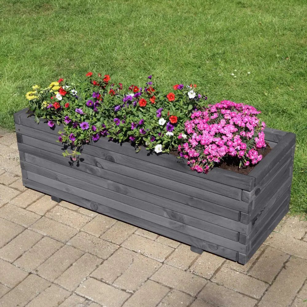 Large wooden trough planters offer ample space for flourishing gardens and lush landscapes.