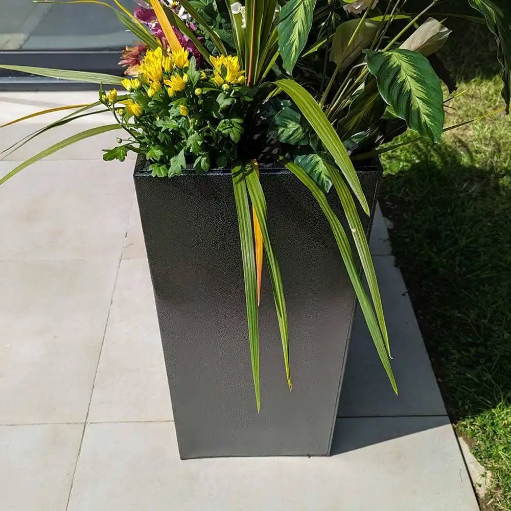Large outdoor planters on a spacious deck