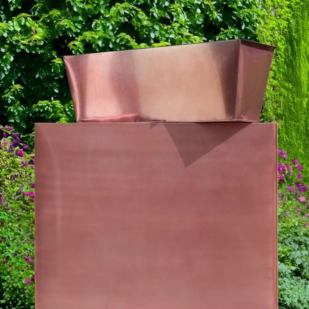 Modern rose gold trough planter with a vertical design, perfect for displaying trailing or cascading plants.