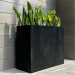 Reach new heights of sophistication with extra tall planters.