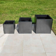 Stylish zinc planters enhancing outdoor decor