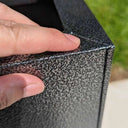 Zinc planters adding a modern touch to a garden