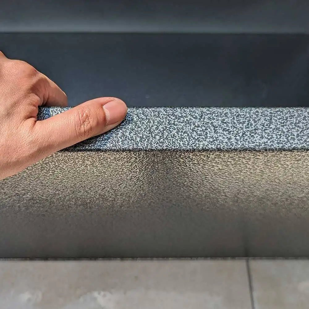 Sleek design of large trough planters in the courtyard.