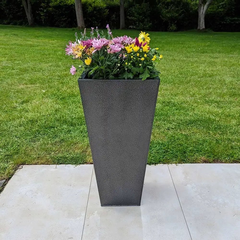 Long planters creating visual interest along the pathway.
