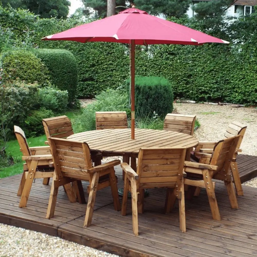 Host memorable gatherings with a spacious Six Seater Dining Set made from Wooden Garden Furniture, protected by a Garden Parasol.