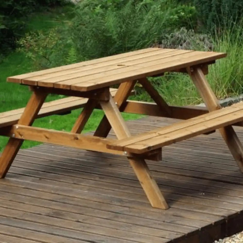 Wooden picnic bench by Woven Wood