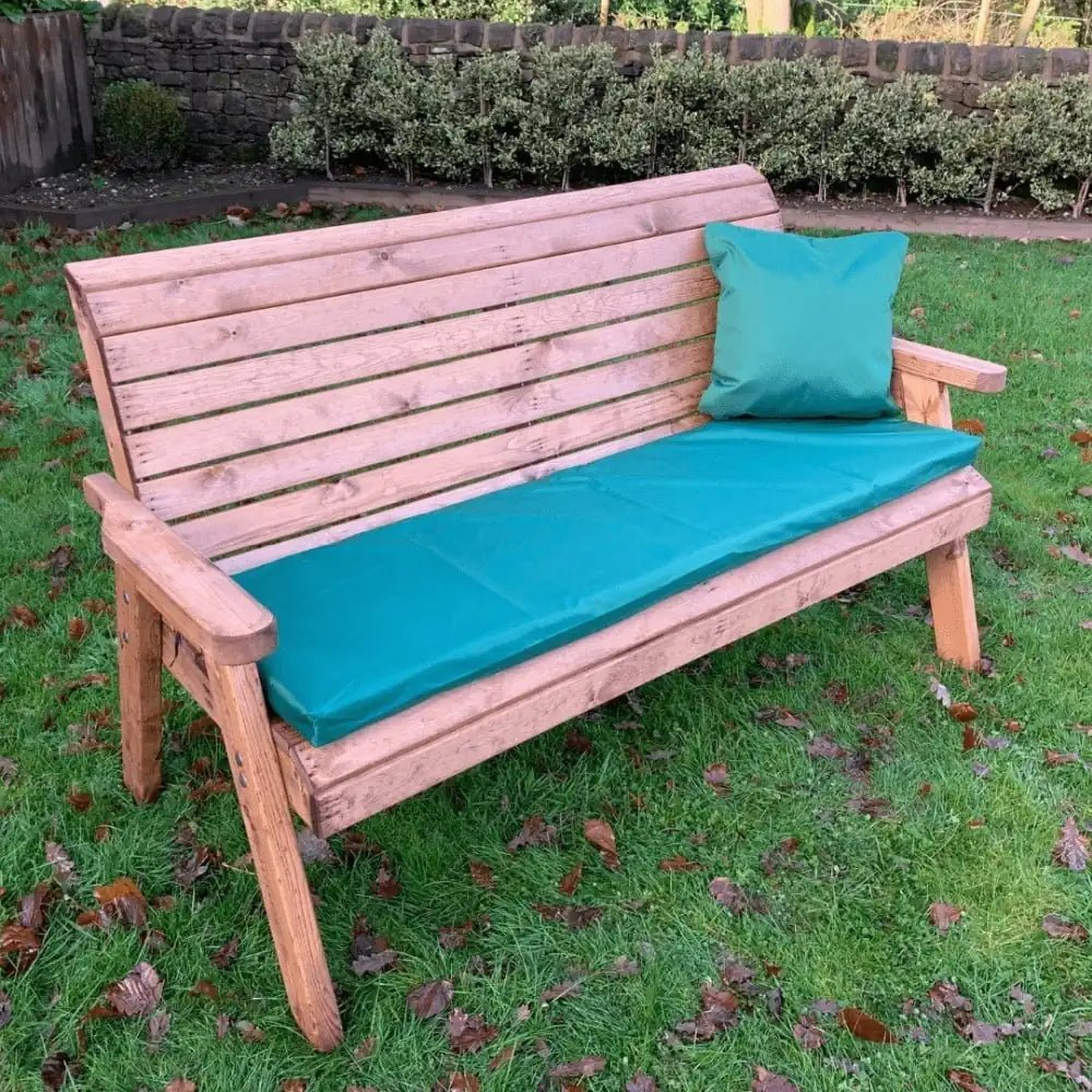 Create a cozy reading nook with this spacious Garden Bench, nestled amongst blooming flowers