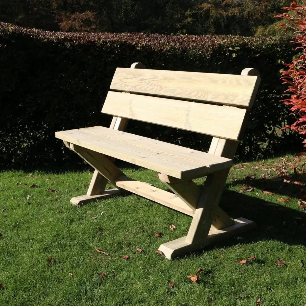 Redwood garden bench adding warmth and natural beauty to a backyard.