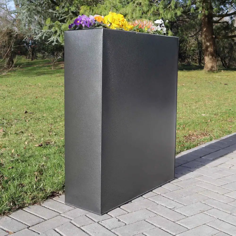 Transform your windowsill into a mini garden with this sleek Metal Window Planter, perfect for succulents or herbs.