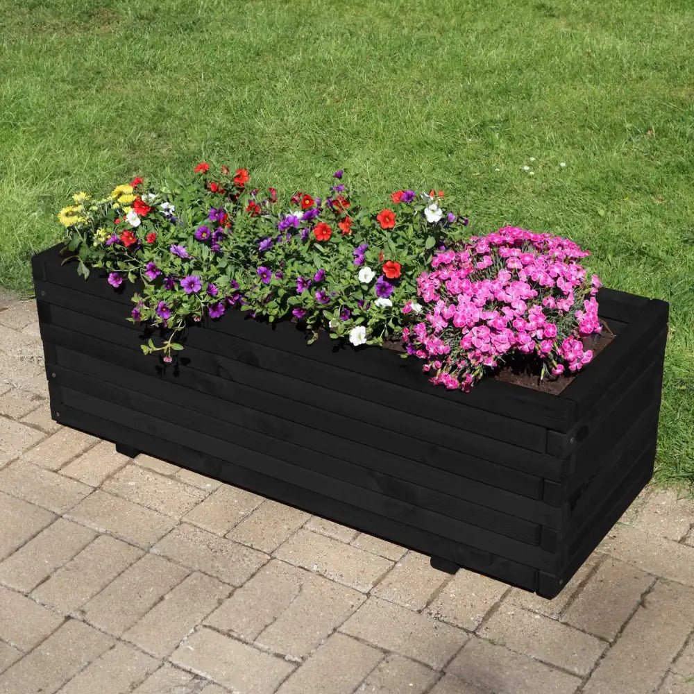 Extra-large outdoor planter: Enhance your outdoor space with this massive-wooden-planter, perfect for creating a lush and welcoming atmosphere.