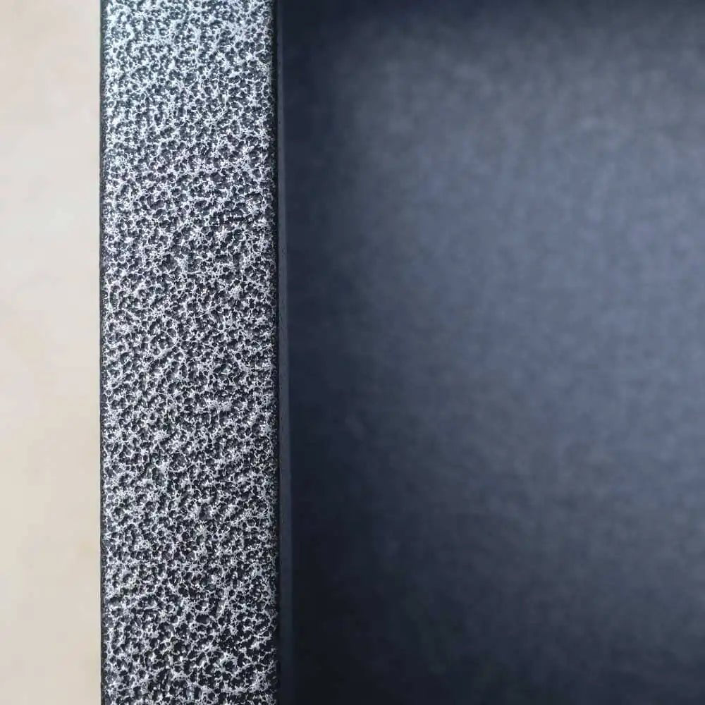 Metallic allure of zinc planters in the landscape.