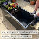 Add our liner to extend your planter warranty by an additional year - gloss black zinc trough planter with fabric liner fitted